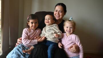 Isaiah Bell, 17 months, with mum Kelela and sisters Kelani, 4, and Gianna, 3.
